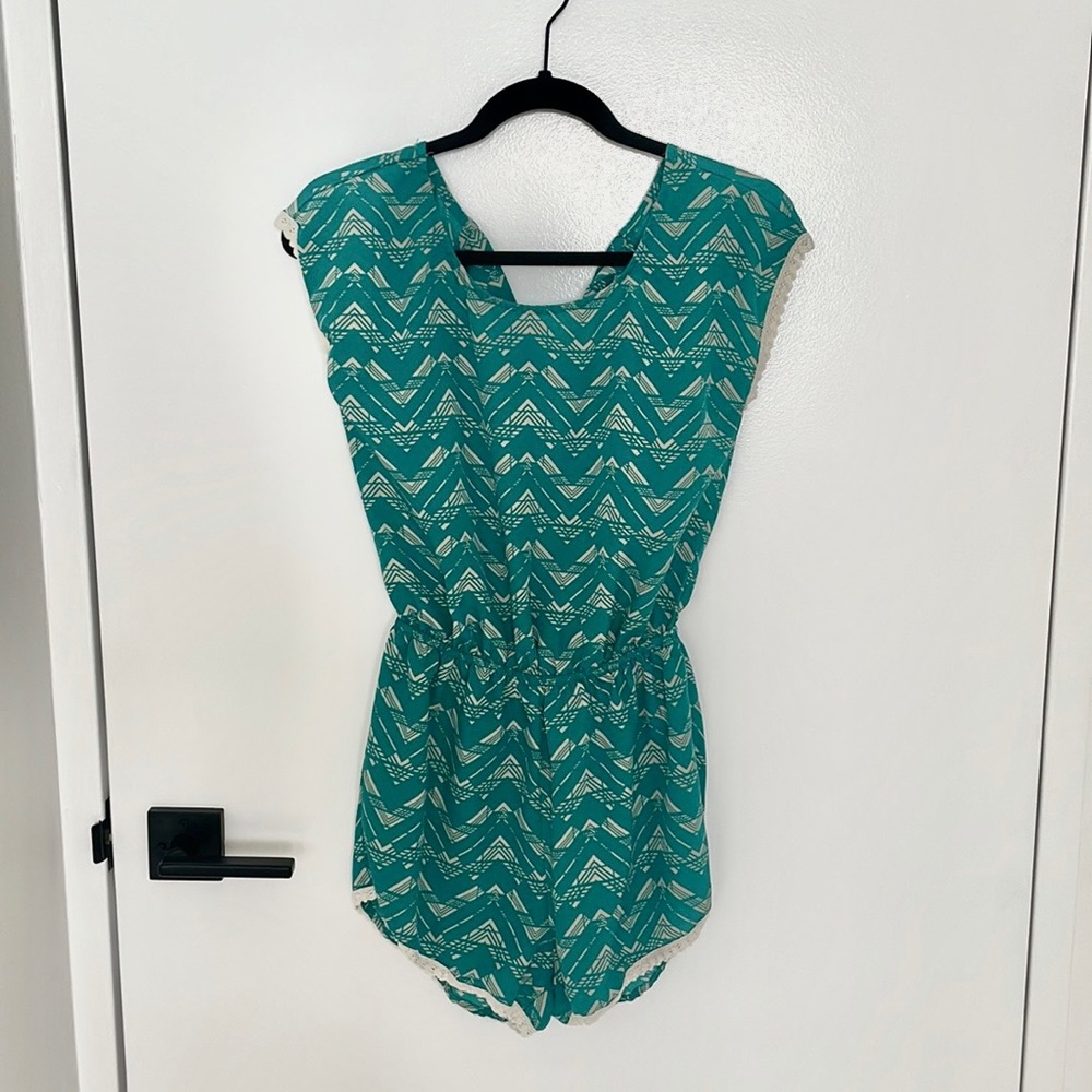 Teal romper with lace detail